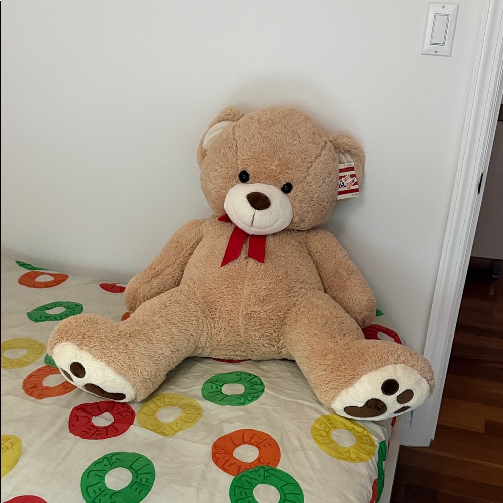Plush Tan Teddy Bear with Red Bow